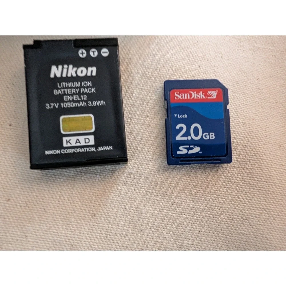 Nikon Coolpix S6000 Silver 14.2MP 7x Zoom Digital Camera SD Card Charger Working